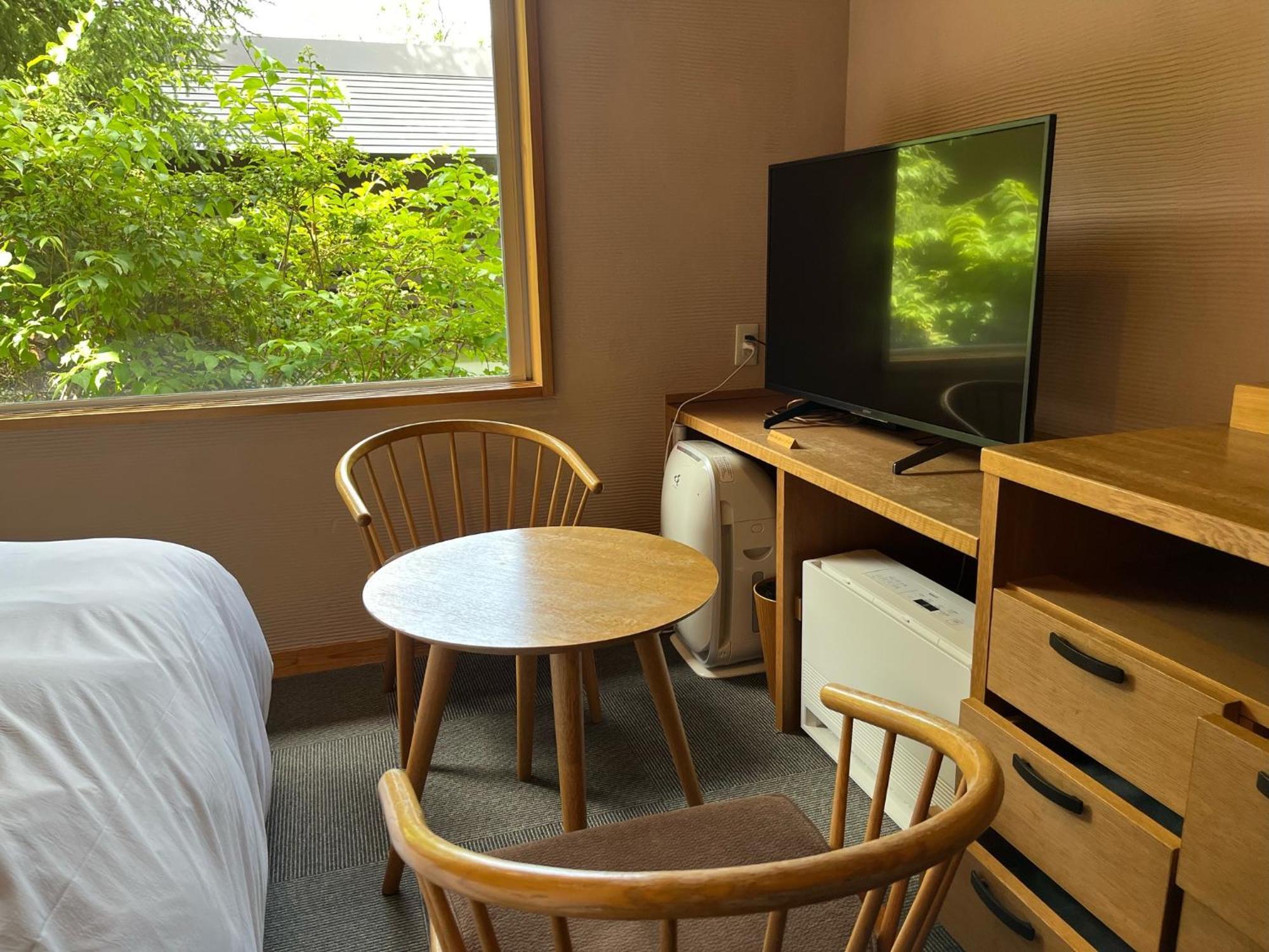Miyama Ouan Kyoritsu Resort Takayama  Rum bild A room at the hotel